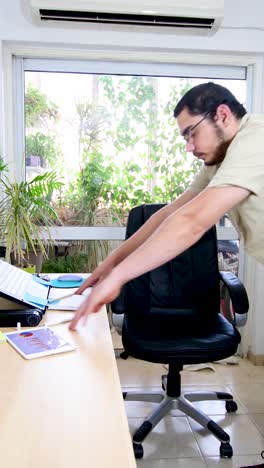businessman doing exercise in office.
