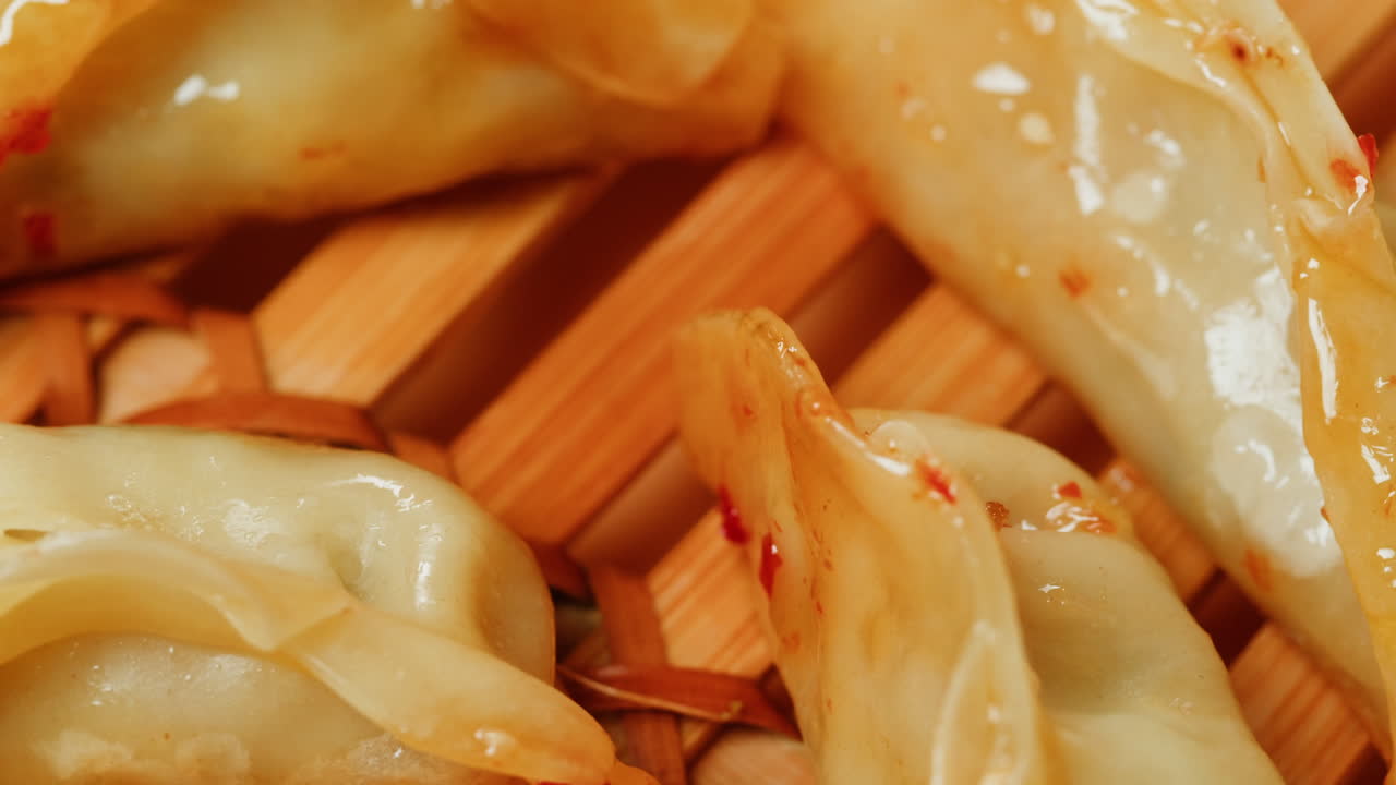 Close-up Rotating View of Delicious Pan-Fried Dumplings