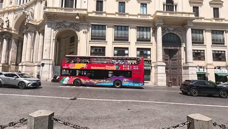 tourist bus passing historic building in naples