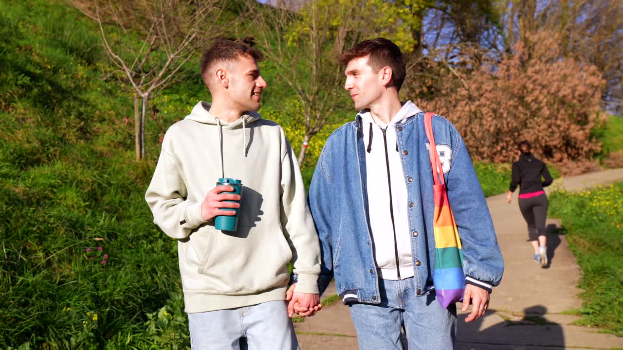 Gay Couple Walking in Park