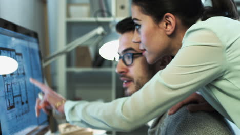 small business team of architects working at night