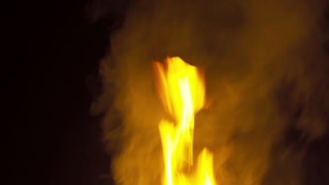 fire in camping. red fireplace and frame burning wood with coal in stove for giving warm, heat and smoke on black background.