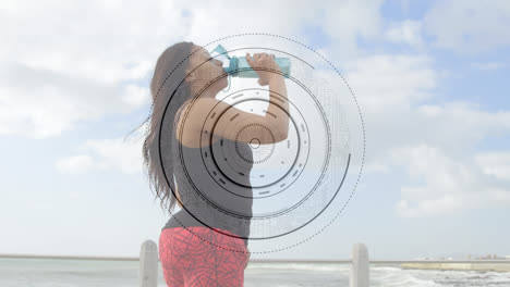 animation of scope scanning over woman with artificial limb drinking water by seaside