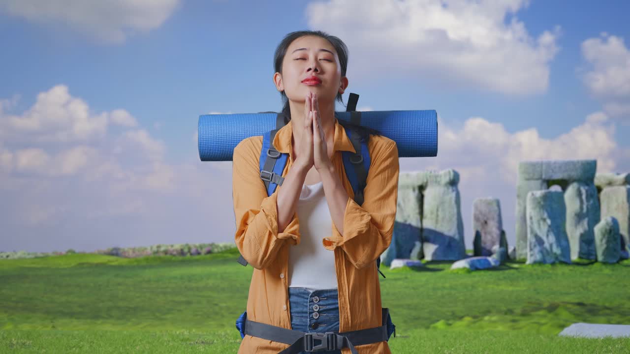 Woman Praying at Stonehenge