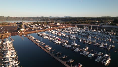 docks at sunset seaside drone shot in yaquina