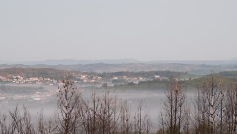 Misty-morning-on-a-remote-village-located-in-the-mountains