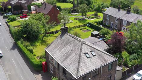 drone footage over english countryside houses and gardens