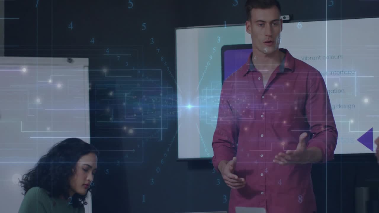 Man presenting digital data animation over diverse colleagues in modern office