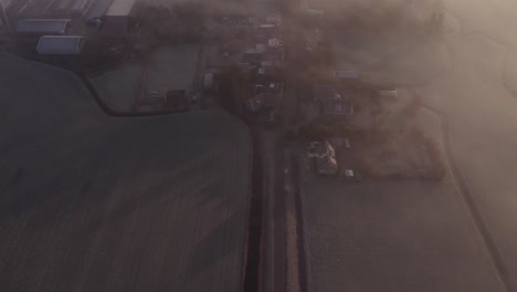 magical morning at cornwerd friesland with dense fog sunrise, aerial