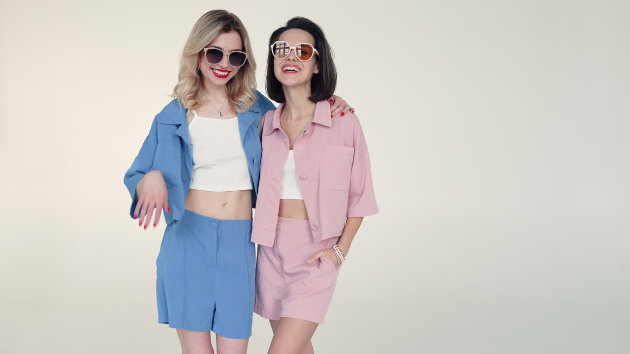Two Friends in Trendy Summer Outfits