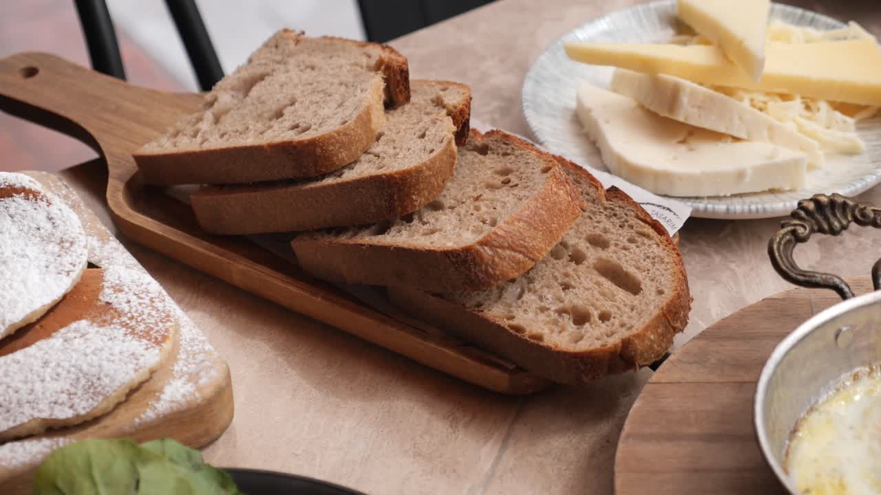 Turkish Breakfast with Bread, Pancakes, and Cheese