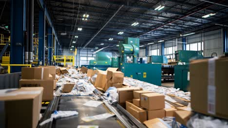 packages piled up on conveyor belt in a busy distribution center
