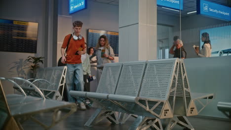 airport waiting area with families