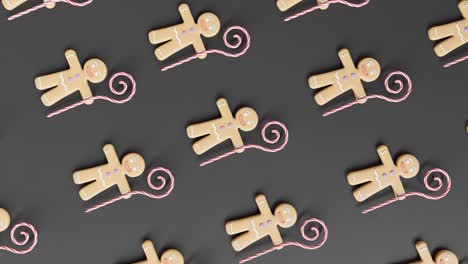 Gingerbread-Men-and-Candy-Canes-on-a-black-background-vertical