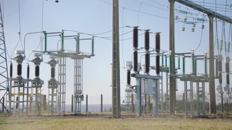 conductors, transformers, transmitters at energy power substation. close-up