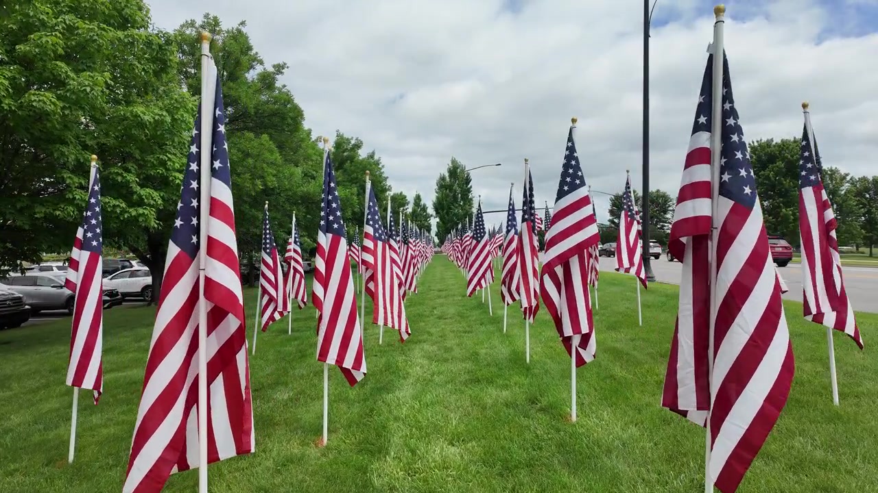 Gimbal shot of field of American flags in field in Westerville, Ohio