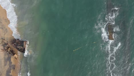 Process-of-dismantling-the-dredger-ship-at-the-coast-of-beach