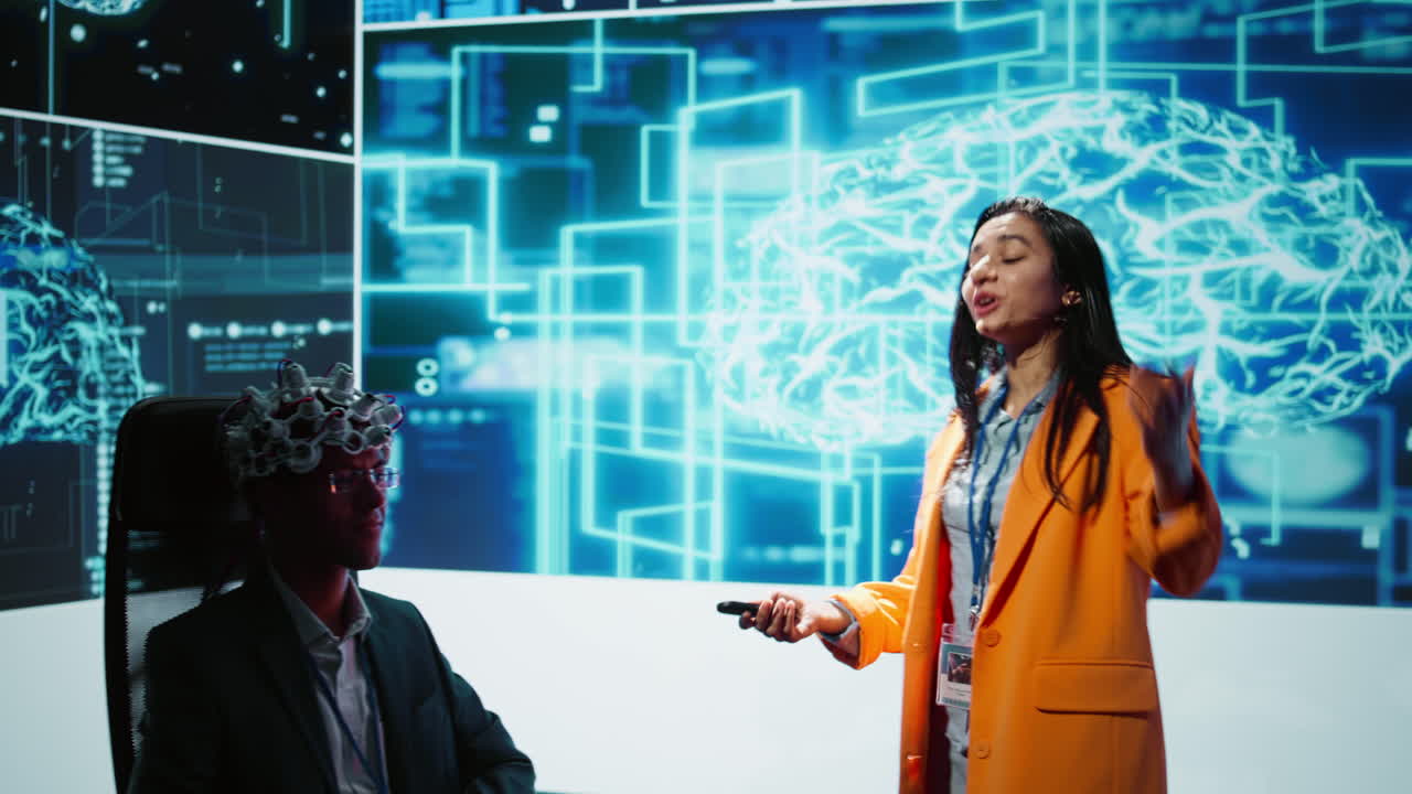 Presenter at AI convention showing EEH headset demonstration