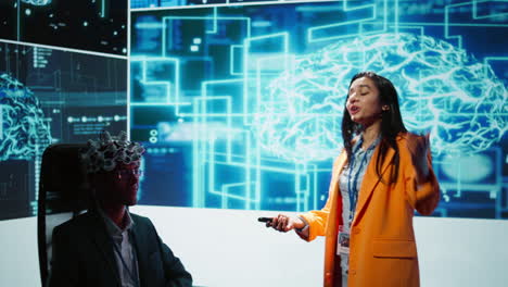 presenter at ai convention showing eeh headset demonstration