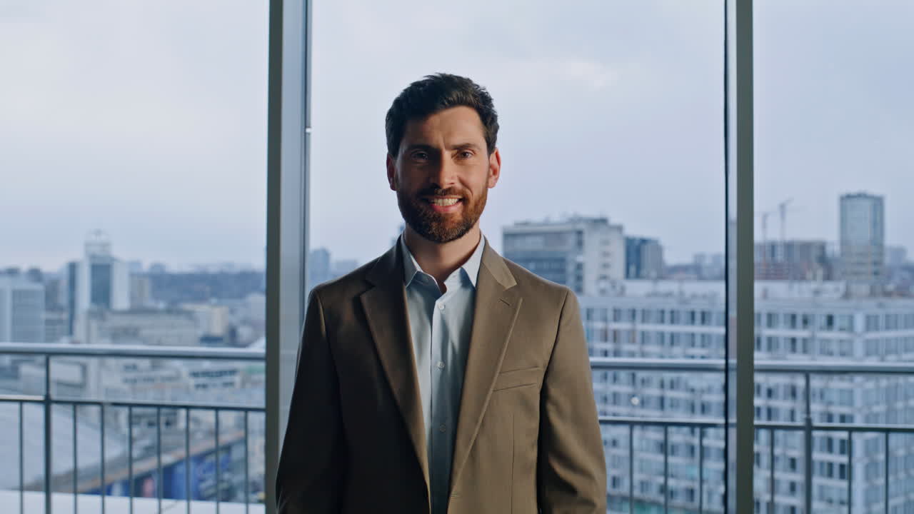Rich business owner looking camera standing panoramic office vestibule closeup