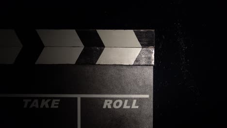 clapperboard with water splash