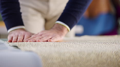 close-up of hand on textured fabric