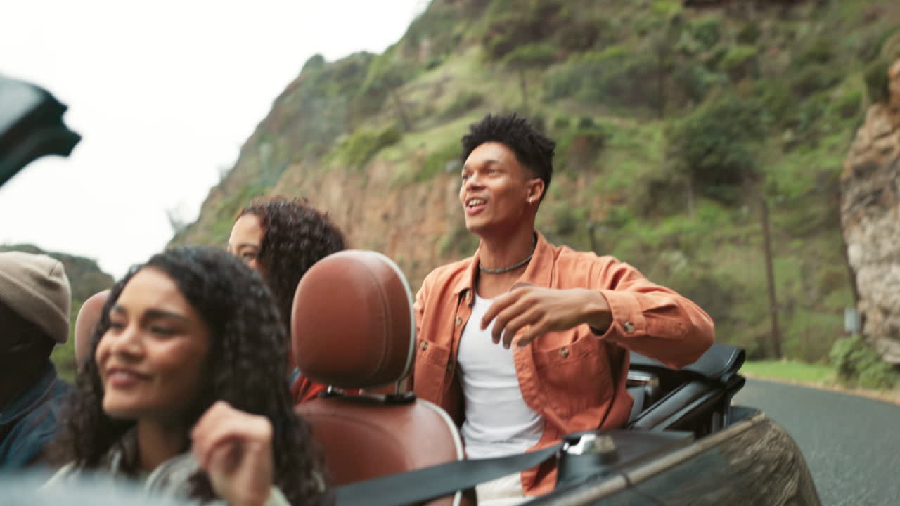 Friends on a road trip in a convertible