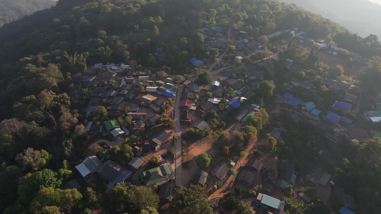Aerial view of isolated village deep in the forest hills, Thailand