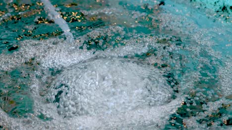 Water bubbles forming in a pool in Chonburi