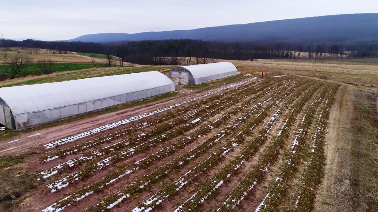 Aerial View of Greenhouses and Fields