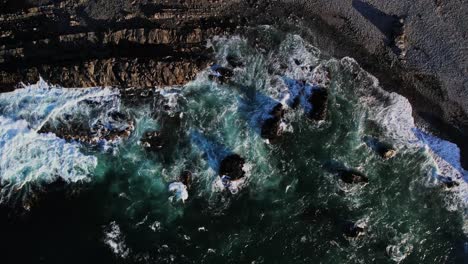 aerial waves hit land coast northern norway