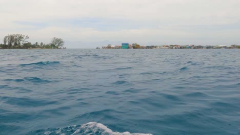 Low-angle-sea-level-ocean-view-from-small-boat-sailing-in-calm-open-Caribbean-sea