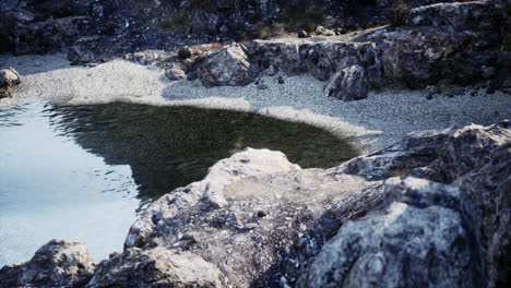 rocky beach with clear water