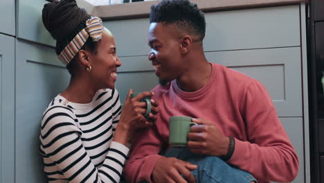 Kitchen,-tea-cup-and-happy-black-couple-bond