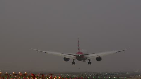 airplane landing in thick fog