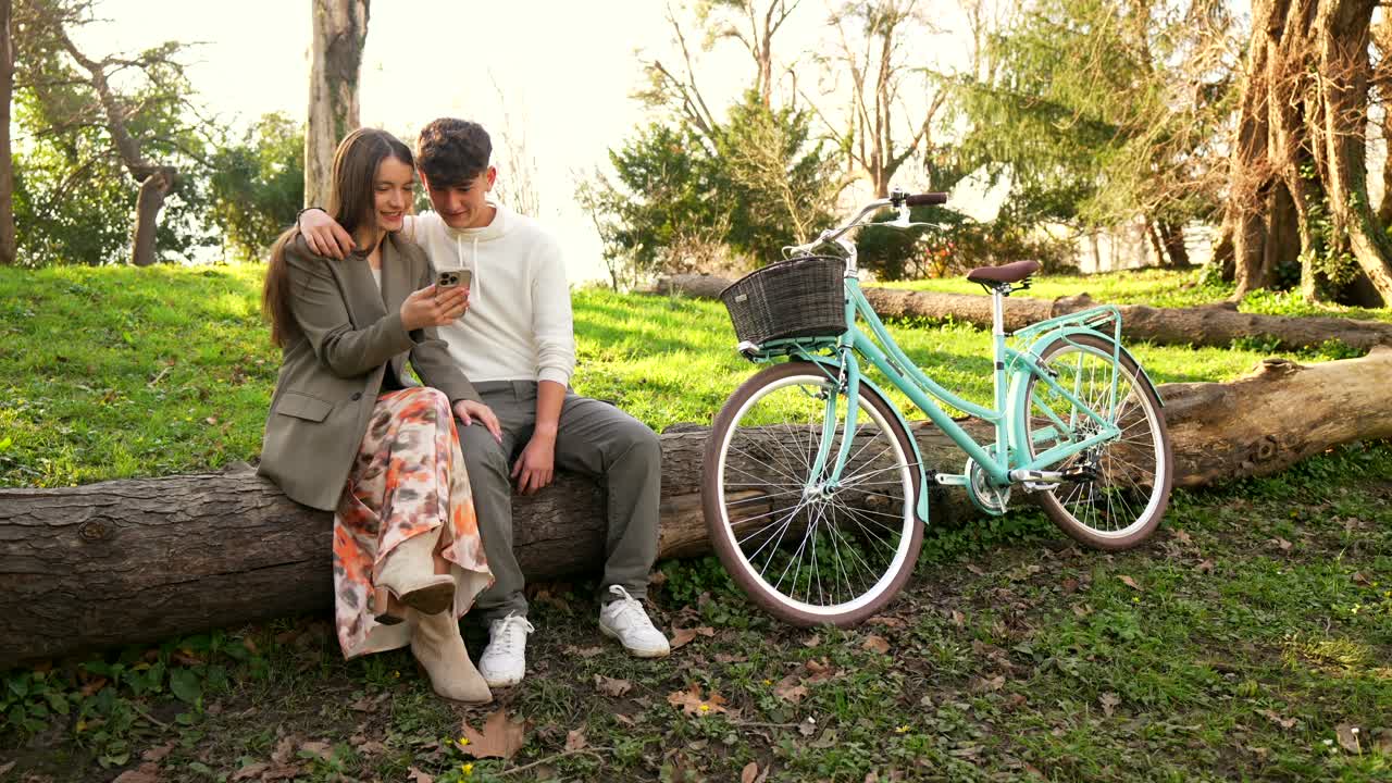 Couple Enjoying a Day Outdoors with a Bicycle