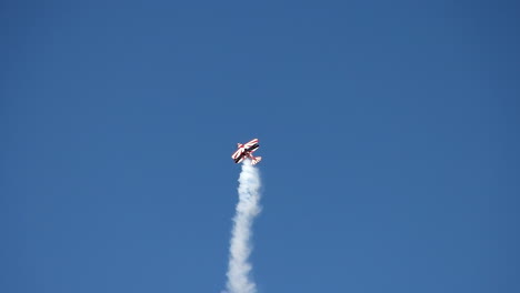 aerobatic pitts s2b performs a hammerhead maneuver in slow motion