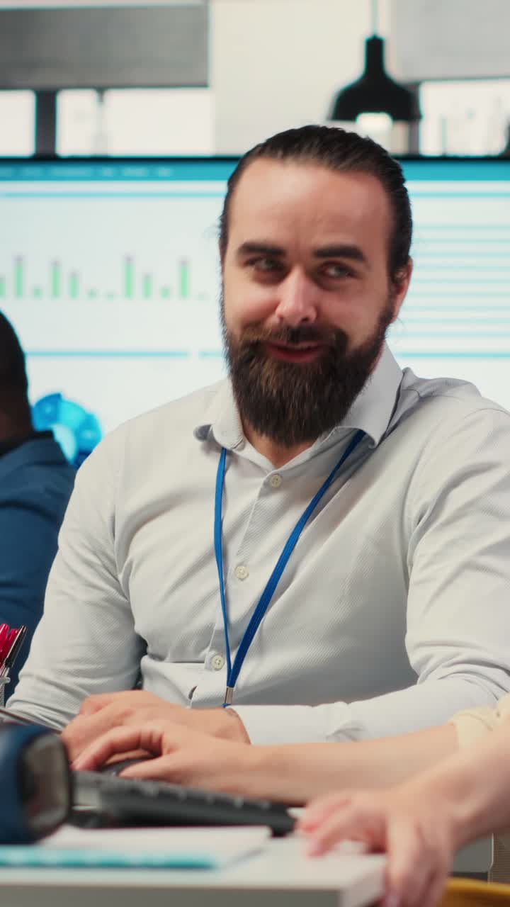 Vertical Video Corporate manager and assistant collaborating on a new expansion vision