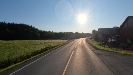 vehicle point-of-view driving a car on a road in norway