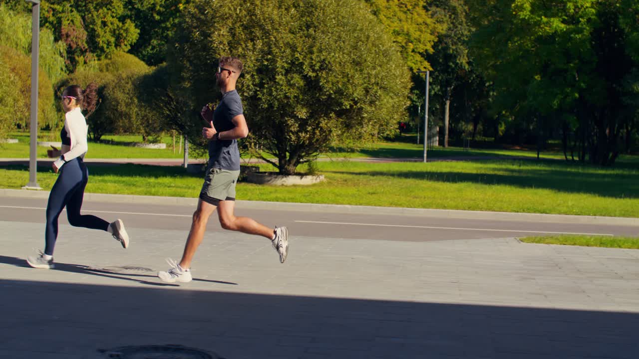 Couple Jogging in the Park on a Sunny Day