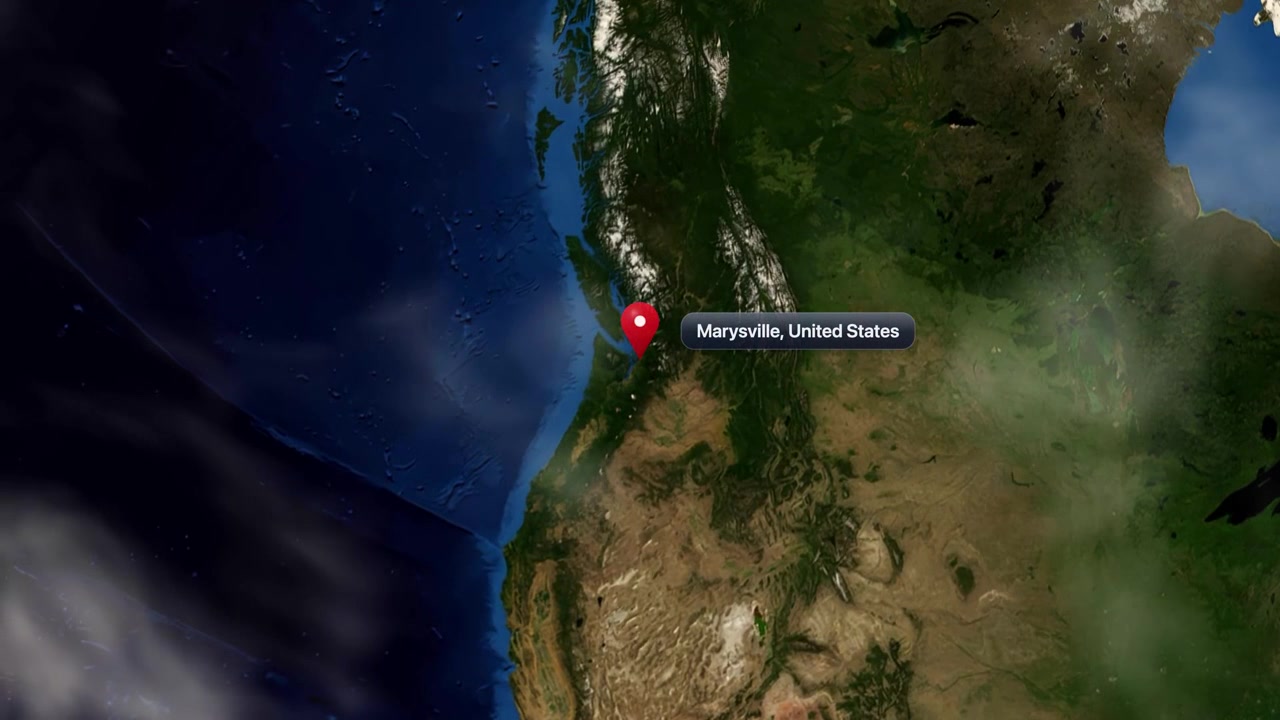 Satellite animation zooms from deep space into planet Earth, pinpointing Marysville, Washington, United States. Includes NASA public domain imagery.