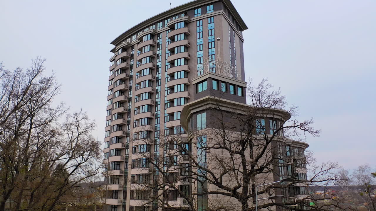 Apartment building room in living area. New block of modern apartments with balconies and blue sky in the background