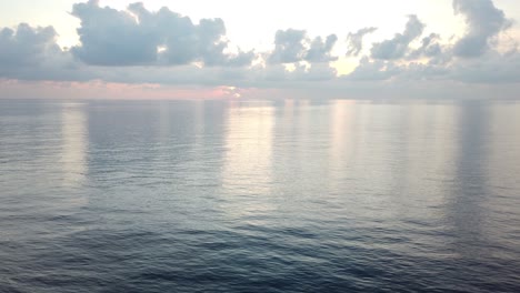 4k sunset over waves of indian ocean in bay of bengal, andaman islands, india