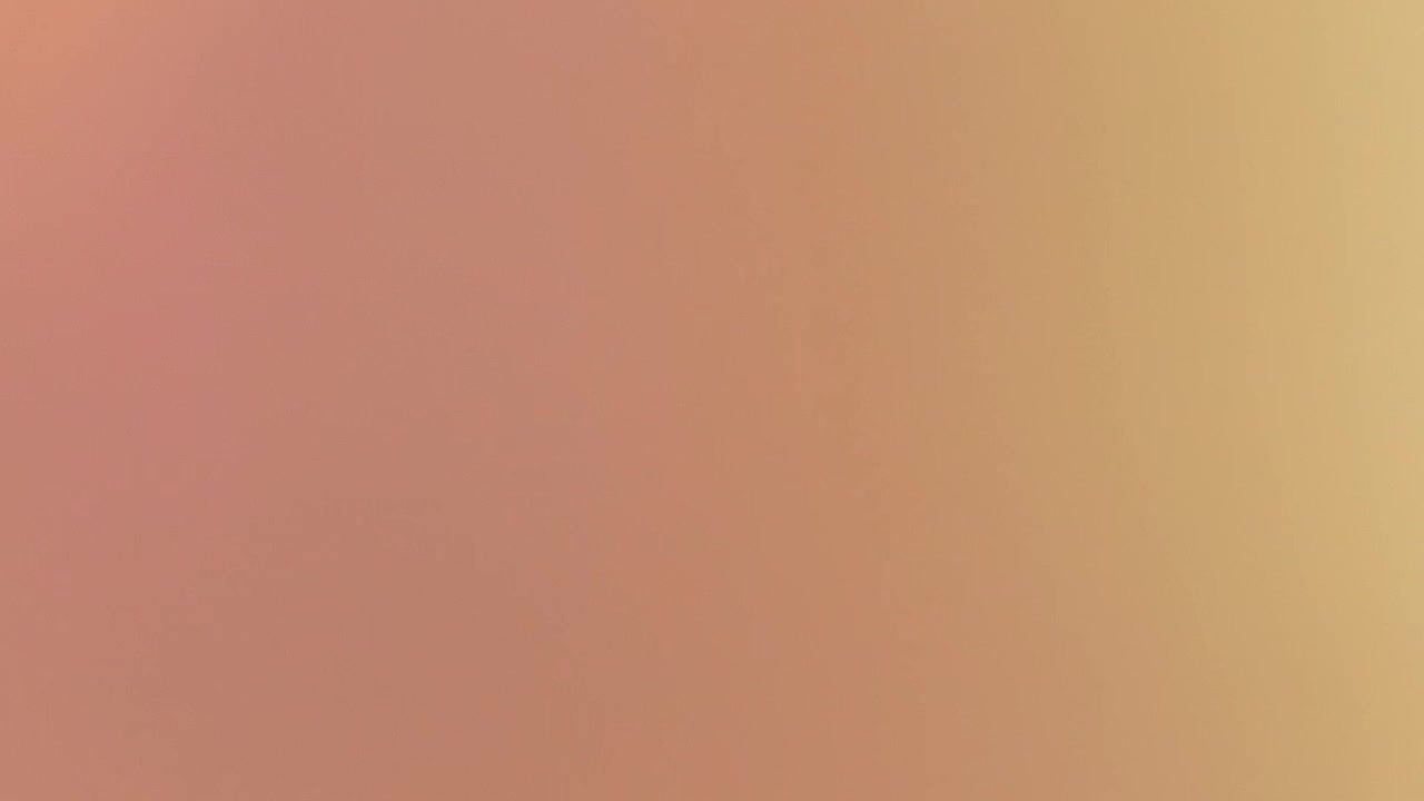 Abstract Light Leak Overlay with Soft Warm Colors