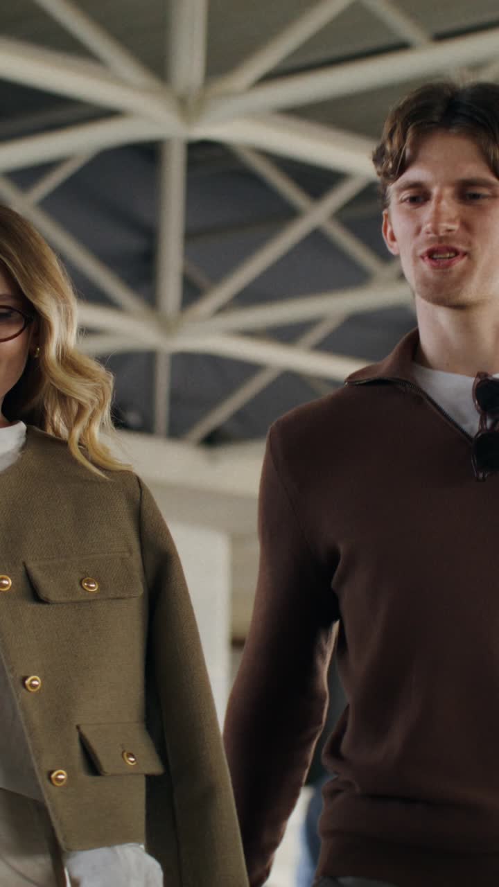 Couple walking in a modern building