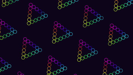 patrón de triángulos de anillos de arco iris en degradado negro