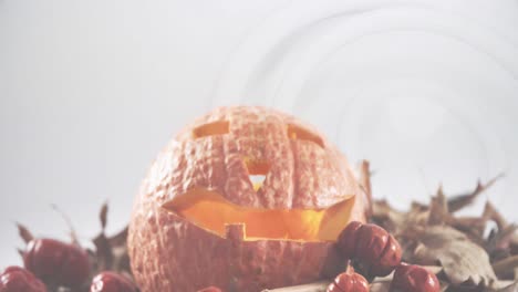 animación de calabaza de halloween cortada, con frutas y hojas de otoño, sobre fondo blanco