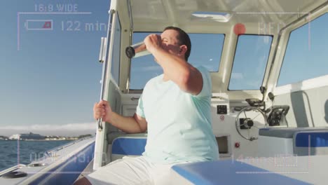 Animation-of-video-recording-interface,-with-happy-man-on-boat-drinking-in-the-sun