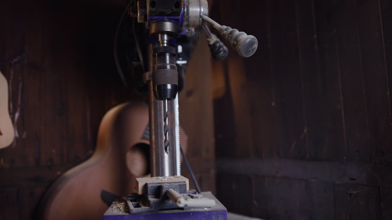 Drill Press and Guitar in Workshop
