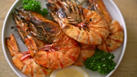 grilled tiger prawns or shrimps with lemon